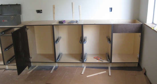 Cabinetry being installed